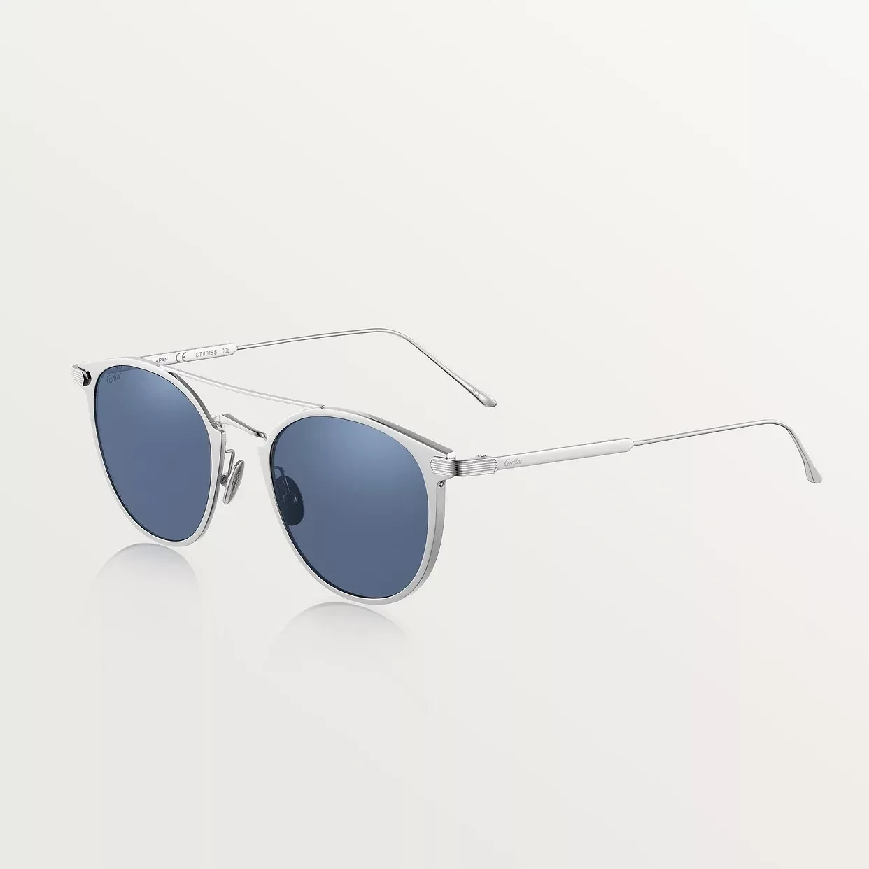Cartier runde Sonnenbrille mit Doppelsteg in Platinoptik und blauen Gläsern